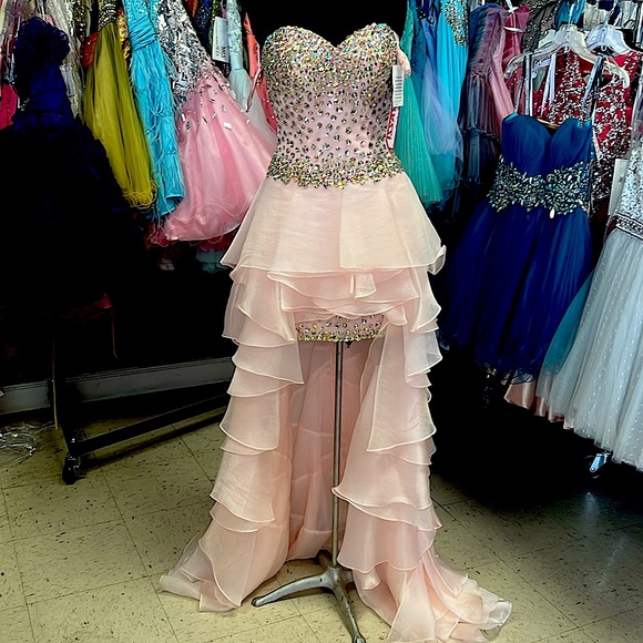 Gorgeous in pink beaded layered high low.